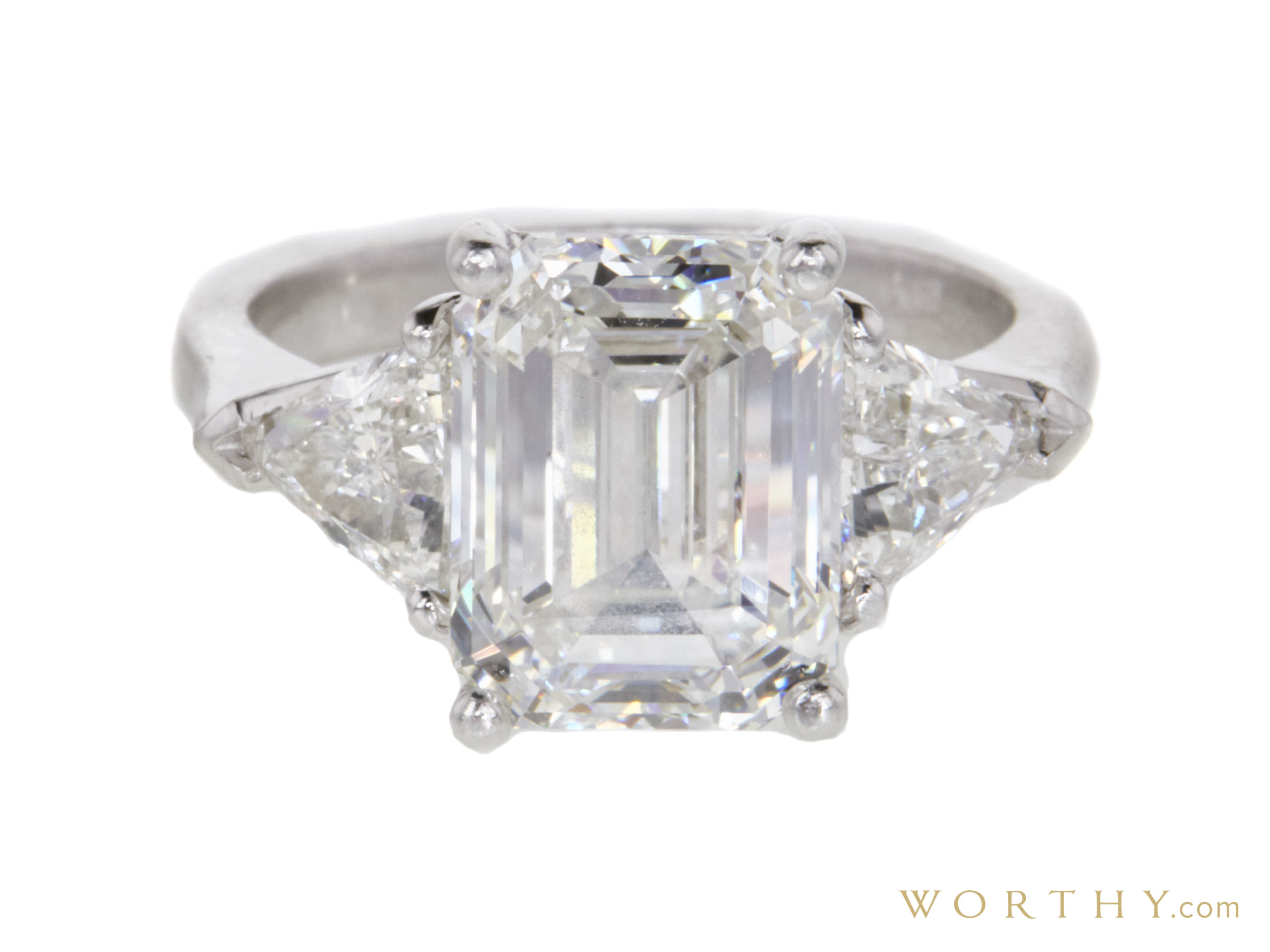 5.01 ct. Emerald Cut 3 Stone Ring | Sold For $77,900 | Worthy.com