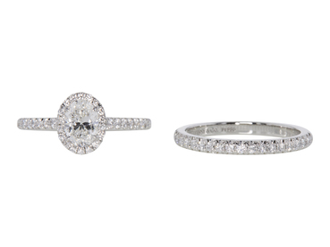 0.64 CT Oval Cut Bridal Set Tiffany & Co. Ring, F, VVS2 0.64 CT Oval Cut Bridal Set Tiffany & Co. Ring, F, VVS2